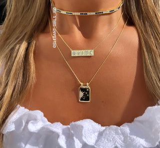 BLACK STARS BAR NECKLACE