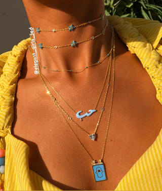BLUE HAMSA HAND BAR NECKLACE