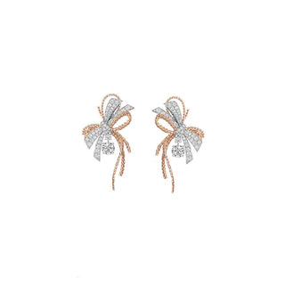 THE LUXURY ROSE SILVER TENNIS BOW EARRING