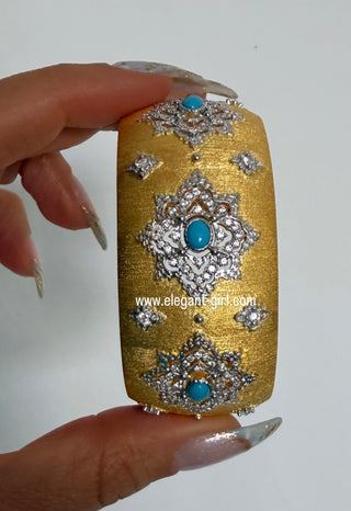 Close-up of royal turquoise bangle showing gold diamond details by Elegant Girl